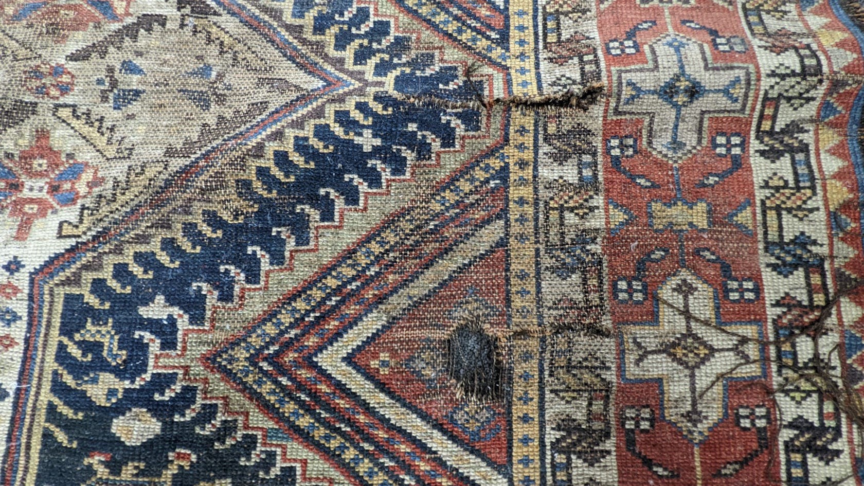 A pair of antique Caucasian blue ground rugs, 290 x 132cm